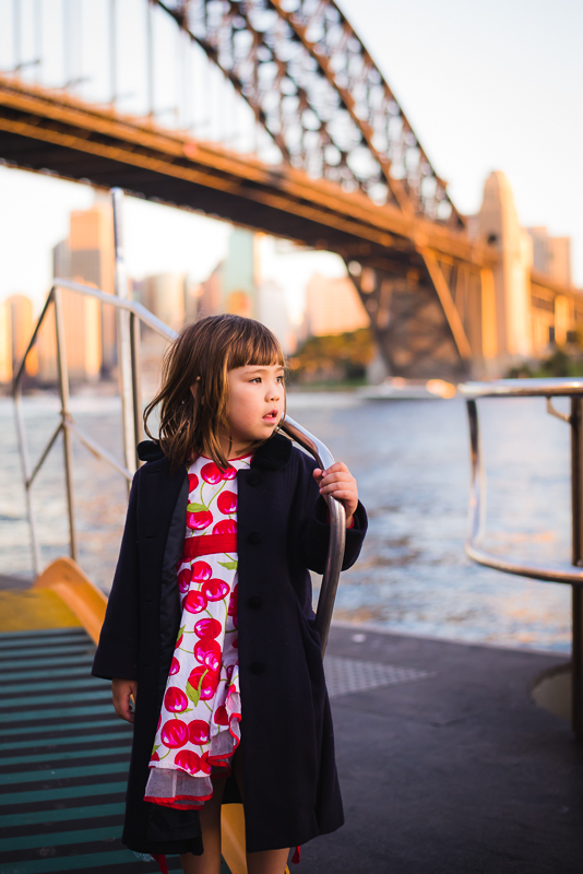 Four year old girl on with Sydney Harbour Bridge