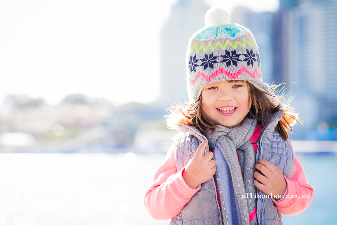Four year old girl on Sydney Harbour in winter