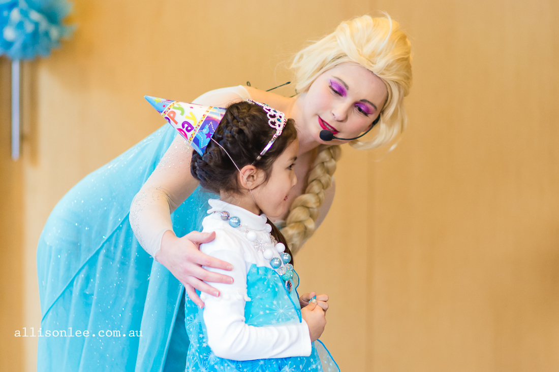 Queen Elsa and five year old birthday girl