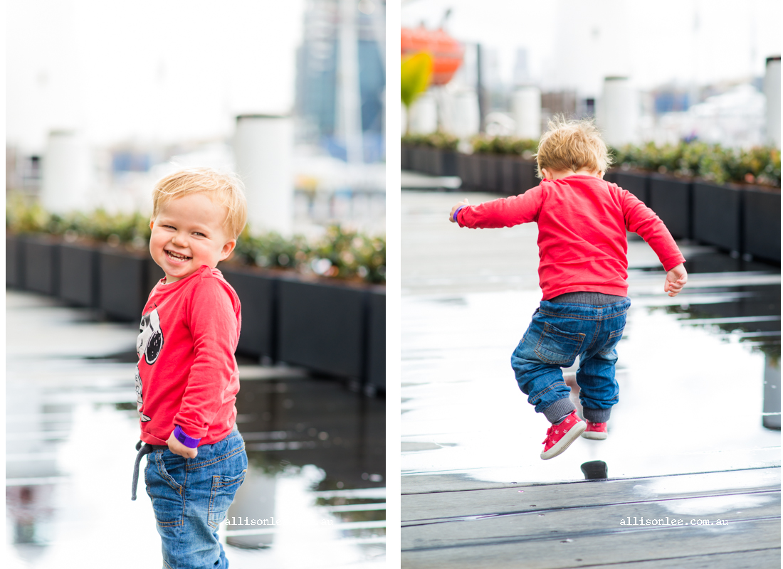 Cheeky two year old splashing in Darling Harbour