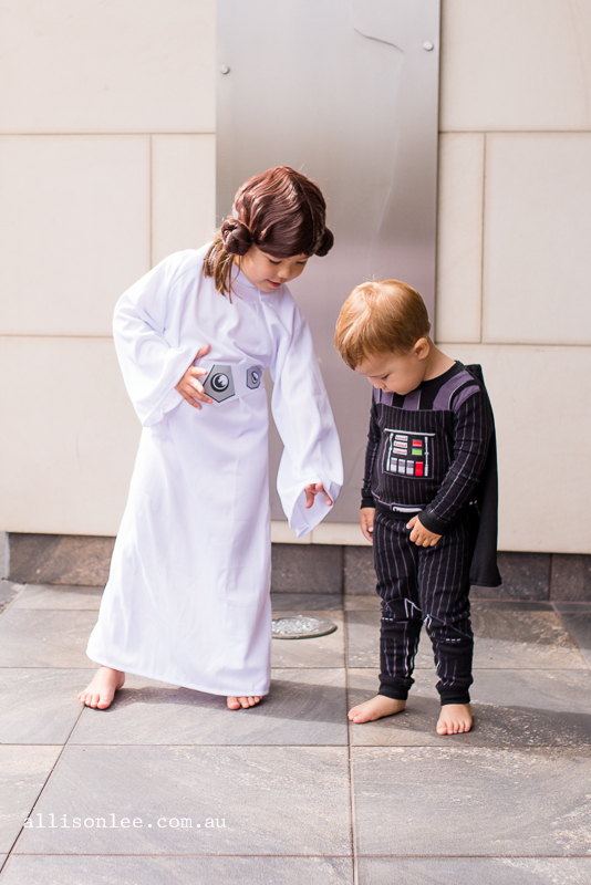 Boy and girl as Princess Leia and Darth Vader