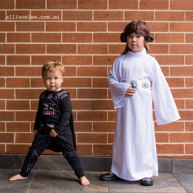 Boy and girl portraits dressed from star wars