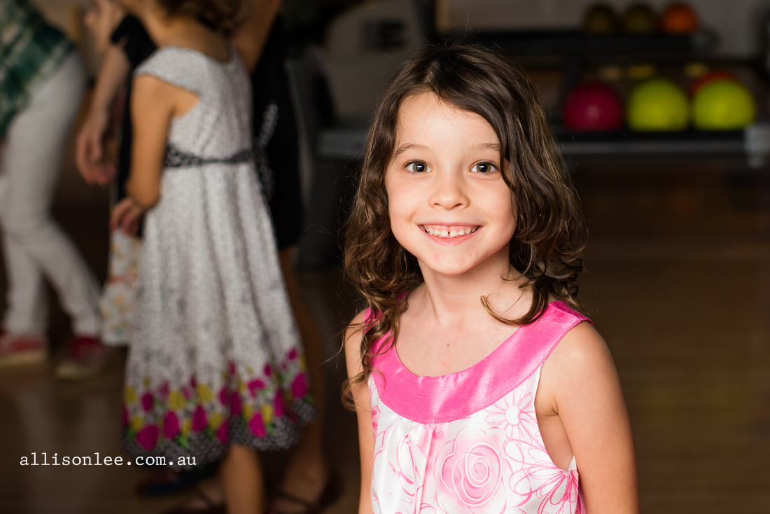 sixth birthday portrait of brown haired girl