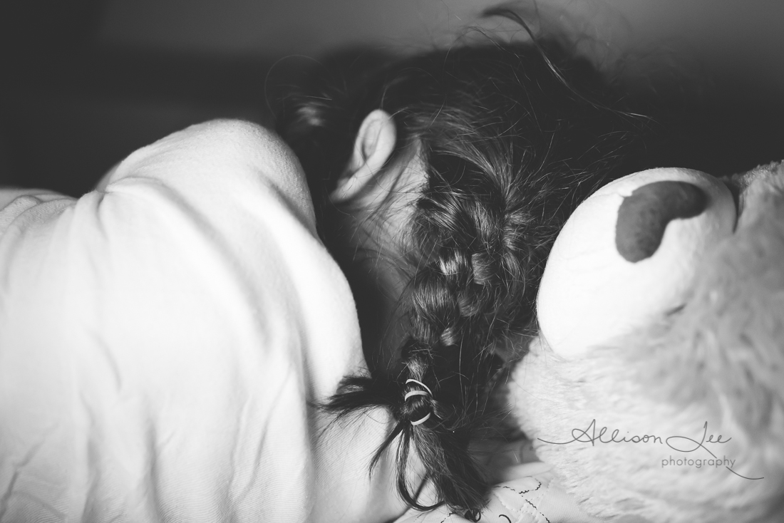 sleeping child with bear child portrait