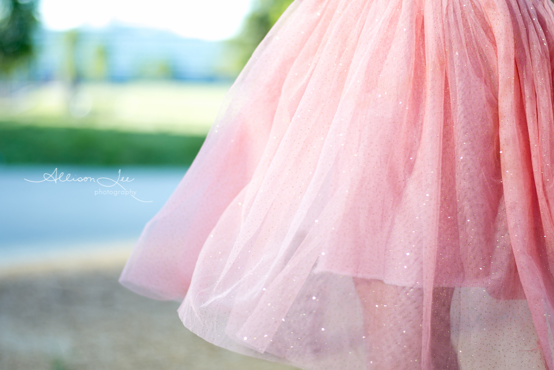 Pink shimmering dress in sunlight