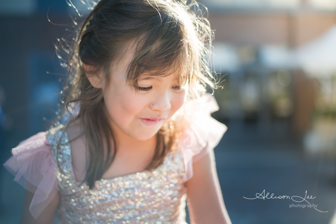 Six year old girl portrait in gold sun