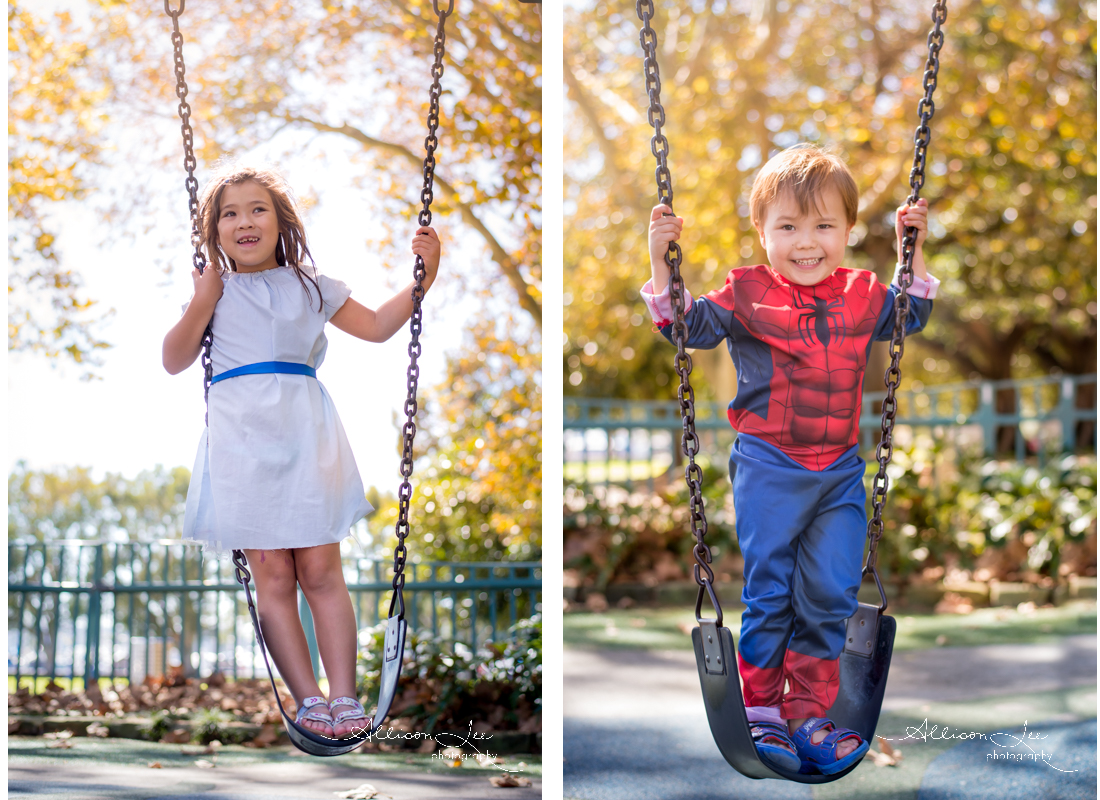 boy and girl in Rushcutters Bay park swinging child portrait