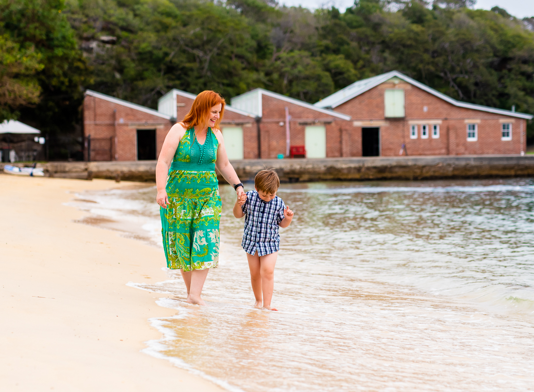 Mum and son playing at the beach at Q Station