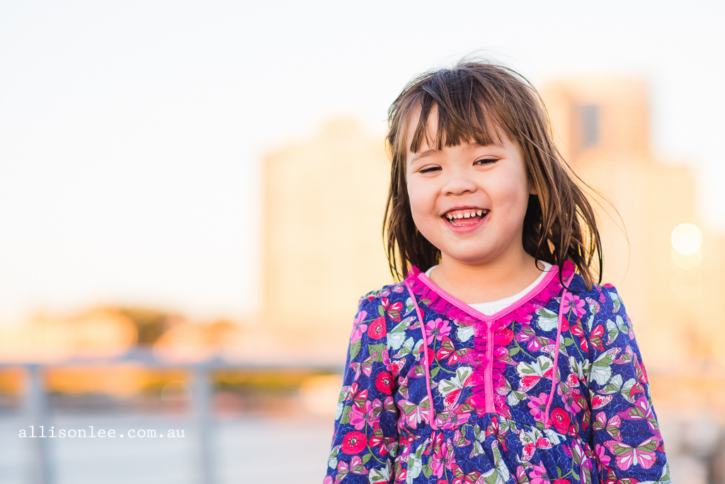 Girl in pink on Sydney Harbour